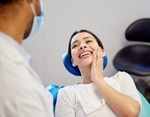 patient smiling after dental treatment