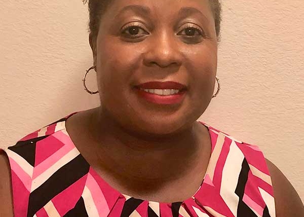 Dr. Tryphose Charles