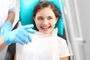 child in dental chair